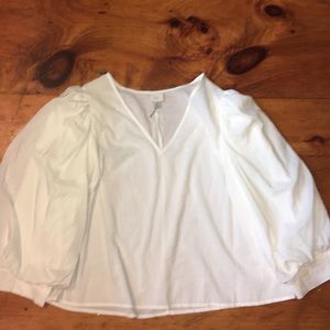 Women’s white puffy long sleeve
